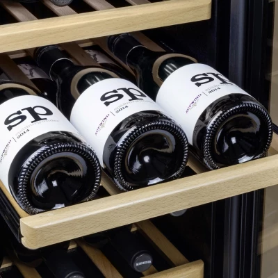 WineComfort 24 in black, a stylish wine cooler designed to store up to 24 bottles with ideal temperature control for optimal win