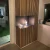 Foco Corner Left 800 - Modern left-sided corner bioethanol fireplace with sleek black design and tempered glass.