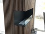 Foco Corner Left 1000 - Modern corner bioethanol fireplace with a sleek black frame and vibrant flames.