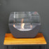 Cradle shaped fireplace in black with two glass panels