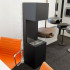 Freestanding bio fireplace opened on three sides making flames more visible.