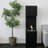 Freestanding bio fireplace opened on three sides making flames more visible.