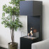 Freestanding bio fireplace opened on three sides making flames more visible.