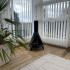 Bio ethanol fireplace in the design of a wood burner